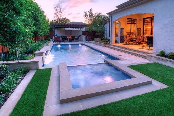 Custom backyard swimming pool representing DA Steel Pools in Langley, British Columbia